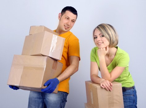 Scheduled furniture pick-up in a modern Holland Park storage unit