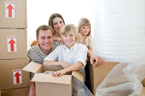 Experienced movers packing items